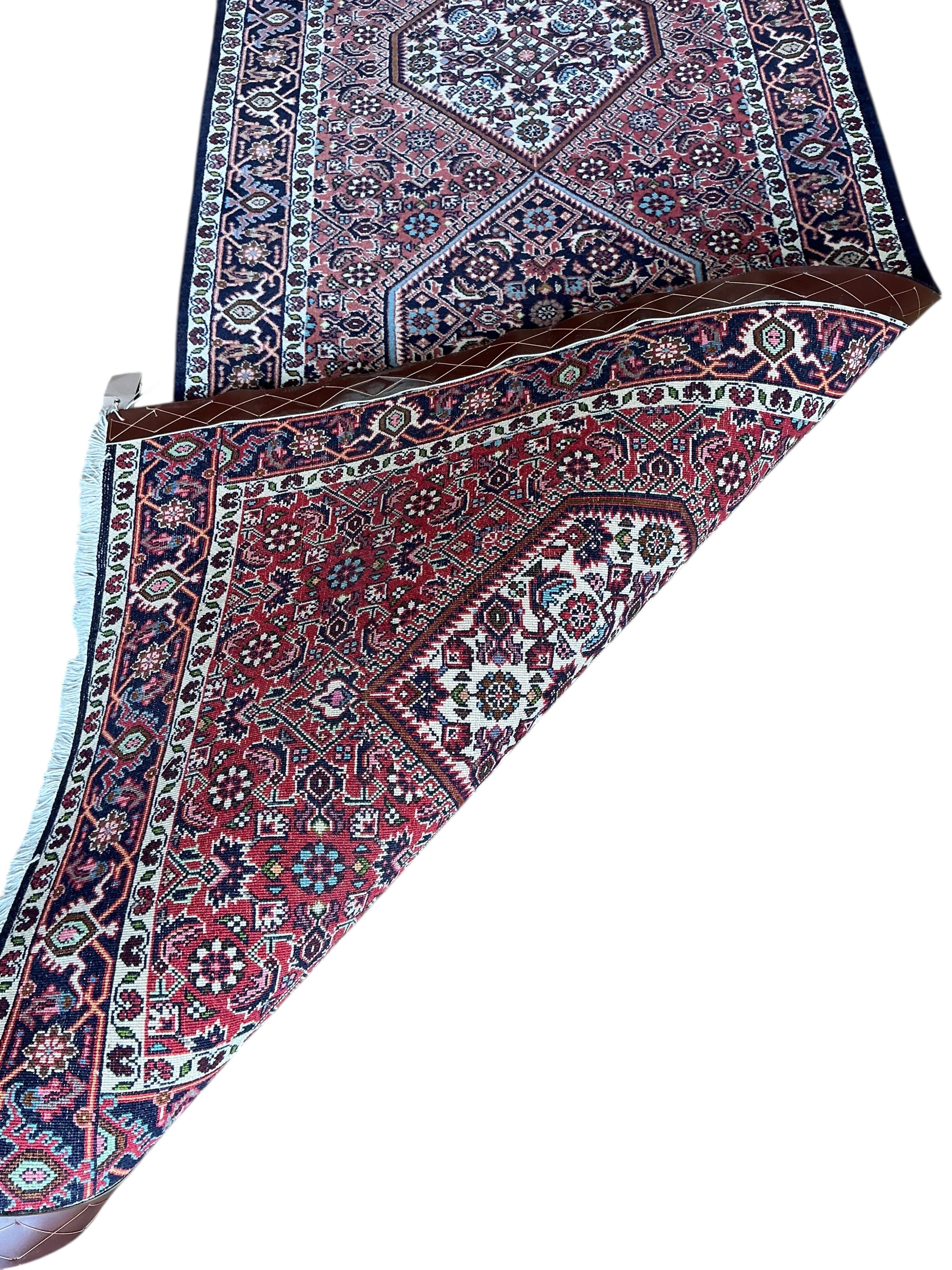 A Bijar red ground runner, approx. 295 x 83cm